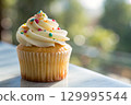 cupcake on wooden table 129995544