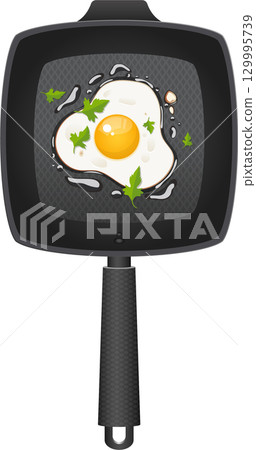 A perfectly fried egg with a bright yellow yolk sits in a nonstick pan garnished with parsley. 129995739