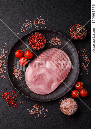 Sliced ham, meat, pork or turkey sausage for sandwiches. Ham slices, food Sliced ham, meat, pork or turkey sausage for sandwiches. Ham slices, food 129995786