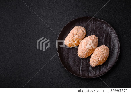 Steamed fish or chicken cutlets or meatballs with salt and spices. Fish cutlets Steamed fish or chicken cutlets or meatballs with salt and spices. Fish cutlets 129995871