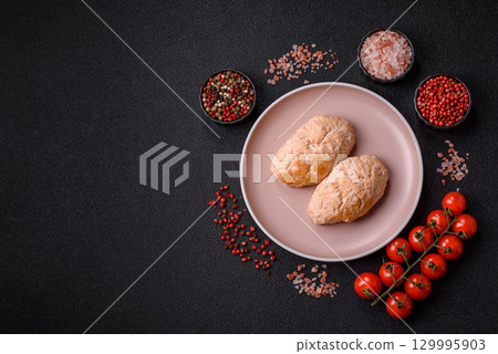 Steamed fish or chicken cutlets or meatballs with salt and spices. Fish cutlets Steamed fish or chicken cutlets or meatballs with salt and spices. Fish cutlets 129995903