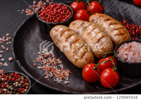 Grilled chicken or beef sausages, a hot meat dish. Barbecued sausages Grilled chicken or beef sausages, a hot meat dish. Barbecued sausages 129995938