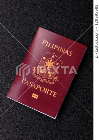 Philippines passport for travelling, flying and doing business. Philippines document 129995992