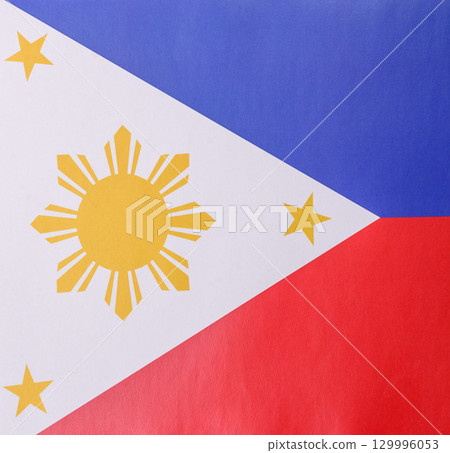 Philippines flag in red, white and blue colors as a symbol of independence. Flag of Philippines 129996053