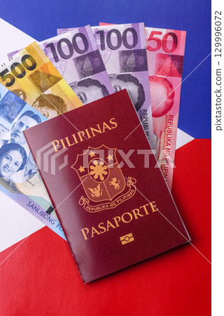 Philippines passport for travelling, flying and doing business. Philippines document 129996072