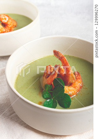 pea cream soup, with shrimp, green soup, homemade, top view, no people, 129996270