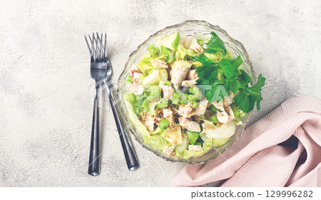 Waldorf salad, celery salad with apple, in a glass salad bowl, natural light, homemade, no people, Waldorf salad, celery salad with apple, in a glass salad bowl, natural light, homemade, no people, 129996282