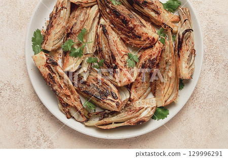 baked, oven-baked fennel, with spices, in olive oil, homemade, no people, baked, oven-baked fennel, with spices, in olive oil, homemade, no people, 129996291