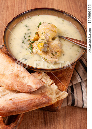 Chikhirtma chicken soup, Georgian dish, with lavash, top view, no people, Chikhirtma chicken soup, Georgian dish, with lavash, top view, no people, 129996333