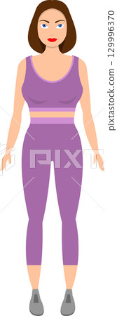 A woman is wearing a purple top and leggings with grey shoes, prepared for exercise or sport. A woman is wearing a purple top and leggings with grey shoes, prepared for exercise or sport. 129996370