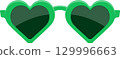 Green heart-shaped sunglasses offer a playful and stylish look for sunny days and outdoor adventures. 129996663