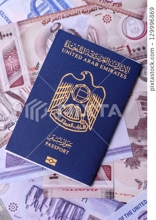 OAE passport for travelling, flying and doing business. Arabic document, id 129996869