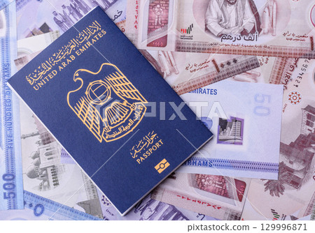 OAE passport for travelling, flying and doing business. Arabic document, id 129996871