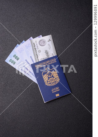 OAE passport for travelling, flying and doing business. Arabic document, id OAE passport for travelling, flying and doing business. Arabic document, id 129996891