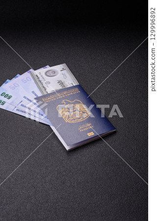 OAE passport for travelling, flying and doing business. Arabic document, id OAE passport for travelling, flying and doing business. Arabic document, id 129996892