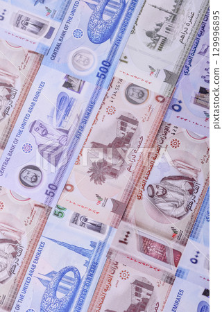 UAE money, dirham, paper banknotes, cash. Emirates money 129996895