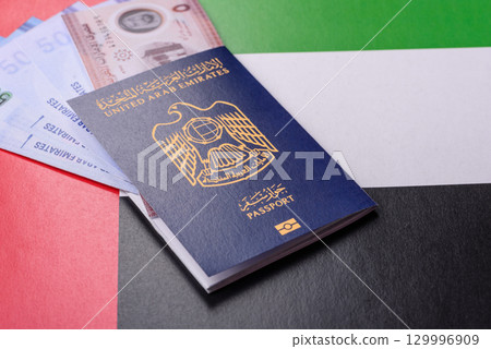 OAE passport for travelling, flying and doing business. Arabic document, id 129996909