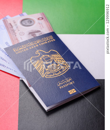 OAE passport for travelling, flying and doing business. Arabic document, id 129996912