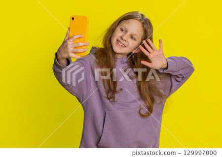 Happy child girl blogger taking portrait selfie record video call online social media subscribers Happy child girl blogger taking portrait selfie record video call online social media subscribers 129997000