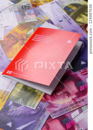 Swiss passport for travelling, flying and doing business. Switzerland document Swiss passport for travelling, flying and doing business. Switzerland document 129997036