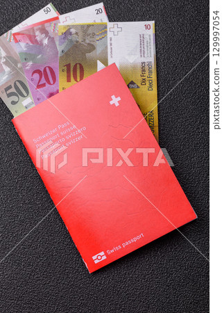Swiss passport for travelling, flying and doing business. Switzerland document 129997054