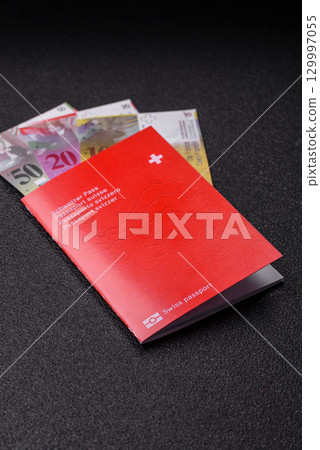 Swiss passport for travelling, flying and doing business. Switzerland document 129997055