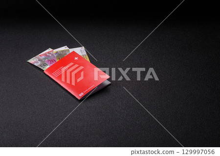 Swiss passport for travelling, flying and doing business. Switzerland document Swiss passport for travelling, flying and doing business. Switzerland document 129997056
