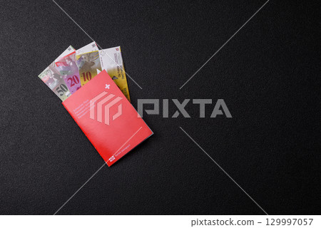 Swiss passport for travelling, flying and doing business. Switzerland document Swiss passport for travelling, flying and doing business. Switzerland document 129997057
