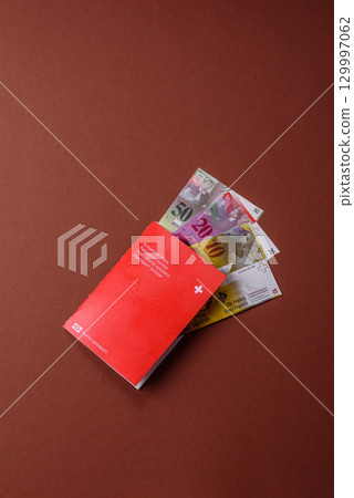 Swiss passport for travelling, flying and doing business. Switzerland document Swiss passport for travelling, flying and doing business. Switzerland document 129997062