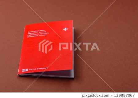 Swiss passport for travelling, flying and doing business. Switzerland document Swiss passport for travelling, flying and doing business. Switzerland document 129997067