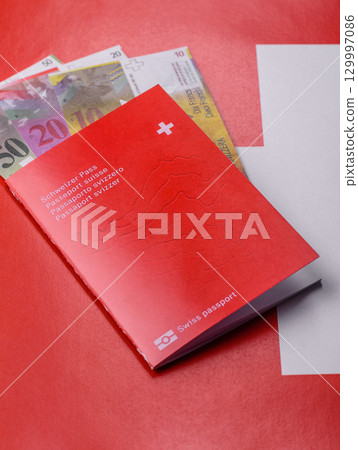 Swiss passport for travelling, flying and doing business. Switzerland document Swiss passport for travelling, flying and doing business. Switzerland document 129997086