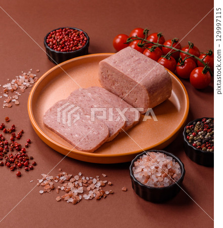 Food, meat, ham sliced in slices for the festive table. Spiced ham Food, meat, ham sliced in slices for the festive table. Spiced ham 129997115