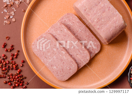 Food, meat, ham sliced in slices for the festive table. Spiced ham Food, meat, ham sliced in slices for the festive table. Spiced ham 129997117