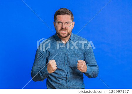 Upset frustrated annoyed man in indignant expression, quarreling, asking reason of conflict Upset frustrated annoyed man in indignant expression, quarreling, asking reason of conflict 129997137
