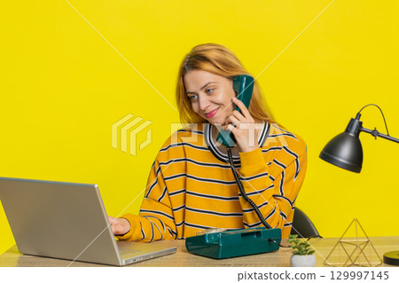 Woman having telephone conversation with client, call center or support service operator helpline Woman having telephone conversation with client, call center or support service operator helpline 129997145