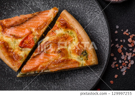 Quiche, salmon pie, broccoli, cheese. Quiche tart with fish and vegetables, cheese Quiche, salmon pie, broccoli, cheese. Quiche tart with fish and vegetables, cheese 129997255