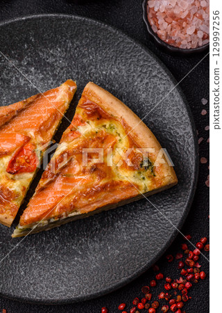 Quiche, salmon pie, broccoli, cheese. Quiche tart with fish and vegetables, cheese Quiche, salmon pie, broccoli, cheese. Quiche tart with fish and vegetables, cheese 129997256