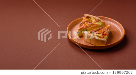 Quiche, salmon pie, broccoli, cheese. Quiche tart with fish and vegetables, cheese 129997262