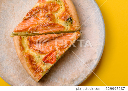 Quiche, salmon pie, broccoli, cheese. Quiche tart with fish and vegetables, cheese 129997287