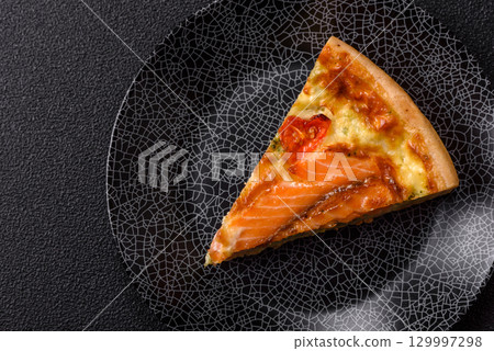 Quiche, salmon pie, broccoli, cheese. Quiche tart with fish and vegetables, cheese 129997298