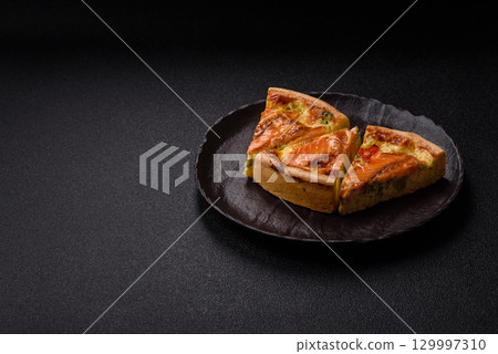 Quiche, salmon pie, broccoli, cheese. Quiche tart with fish and vegetables, cheese Quiche, salmon pie, broccoli, cheese. Quiche tart with fish and vegetables, cheese 129997310