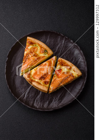 Quiche, salmon pie, broccoli, cheese. Quiche tart with fish and vegetables, cheese Quiche, salmon pie, broccoli, cheese. Quiche tart with fish and vegetables, cheese 129997312