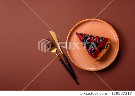 Pie, cheesecake with mascarpone, raspberries and blackberries. Cheesecake with cheese 129997317