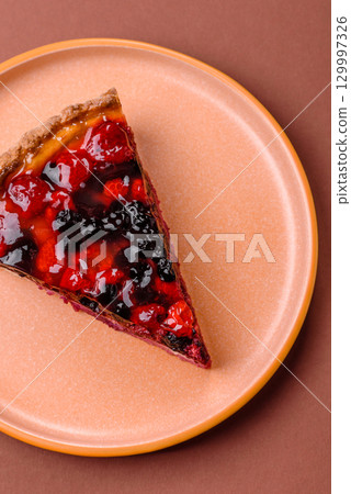 Pie, cheesecake with mascarpone, raspberries and blackberries. Cheesecake with cheese 129997326