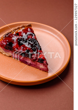 Pie, cheesecake with mascarpone, raspberries and blackberries. Cheesecake with cheese 129997327