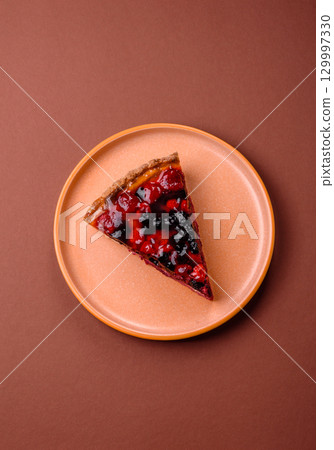 Pie, cheesecake with mascarpone, raspberries and blackberries. Cheesecake with cheese 129997330