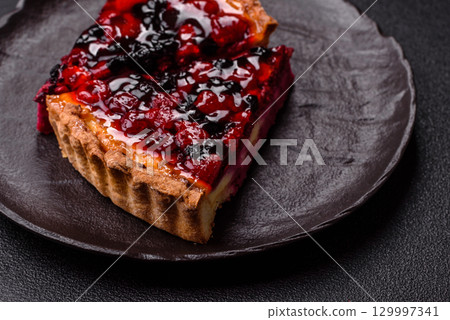 Pie, cheesecake with mascarpone, raspberries and blackberries. Cheesecake with cheese 129997341