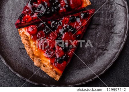 Pie, cheesecake with mascarpone, raspberries and blackberries. Cheesecake with cheese 129997342