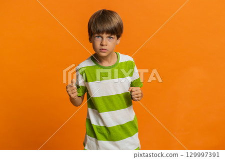 Child boy kid expressing disbelief irritation feeling bored nervous disappointed fail lose game Child boy kid expressing disbelief irritation feeling bored nervous disappointed fail lose game 129997391