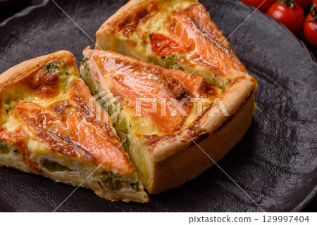 Quiche, salmon pie, broccoli, cheese. Quiche tart with fish and vegetables, cheese Quiche, salmon pie, broccoli, cheese. Quiche tart with fish and vegetables, cheese 129997404